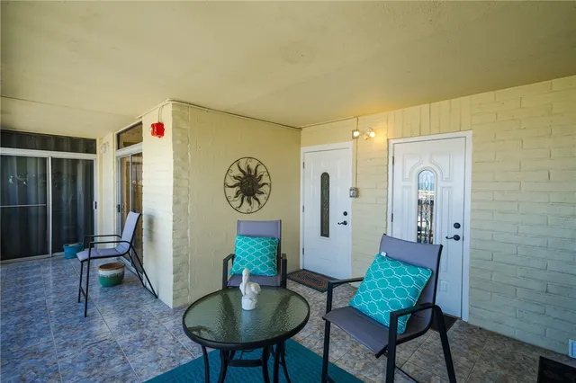 a view of hallway with wooden floor