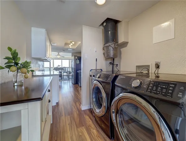 a view of kitchen and utility room