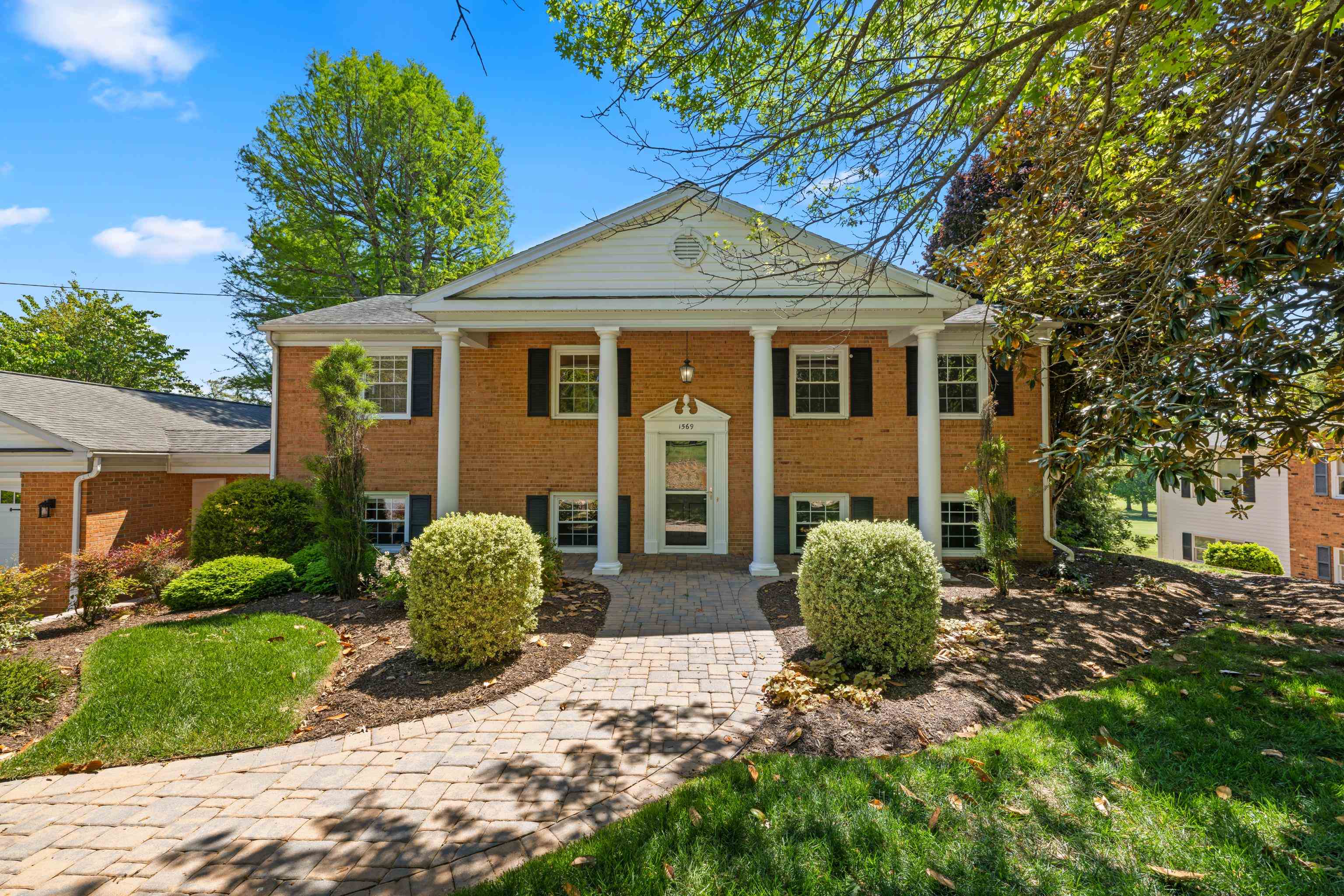 1569 Massanetta Springs Road Harrisonburg, VA 22801 - Photo 2 of 75 a front view of a house with a garden