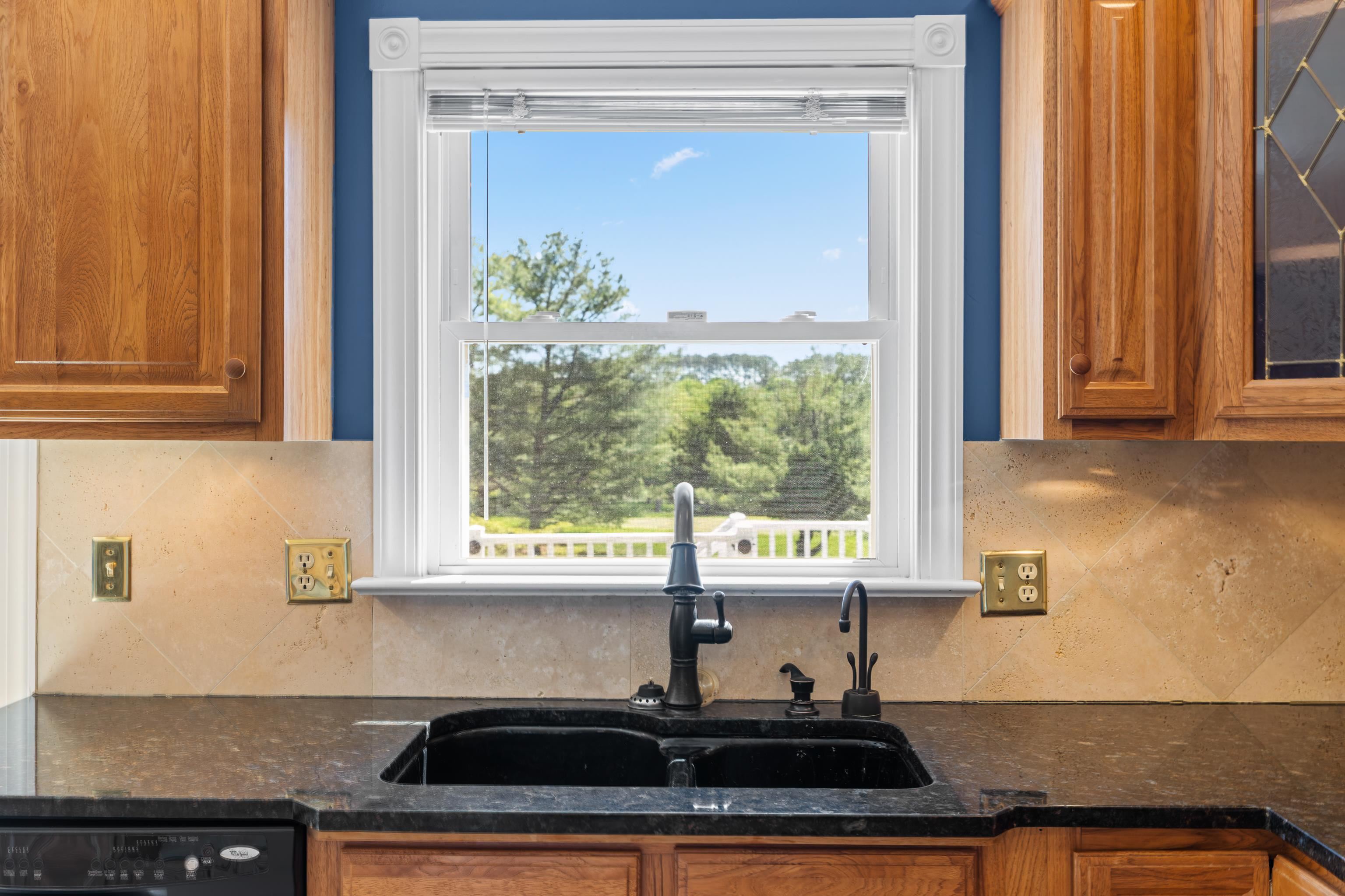 1569 Massanetta Springs Road Harrisonburg, VA 22801 - Photo 27 of 75 a kitchen with granite countertop a sink and a window