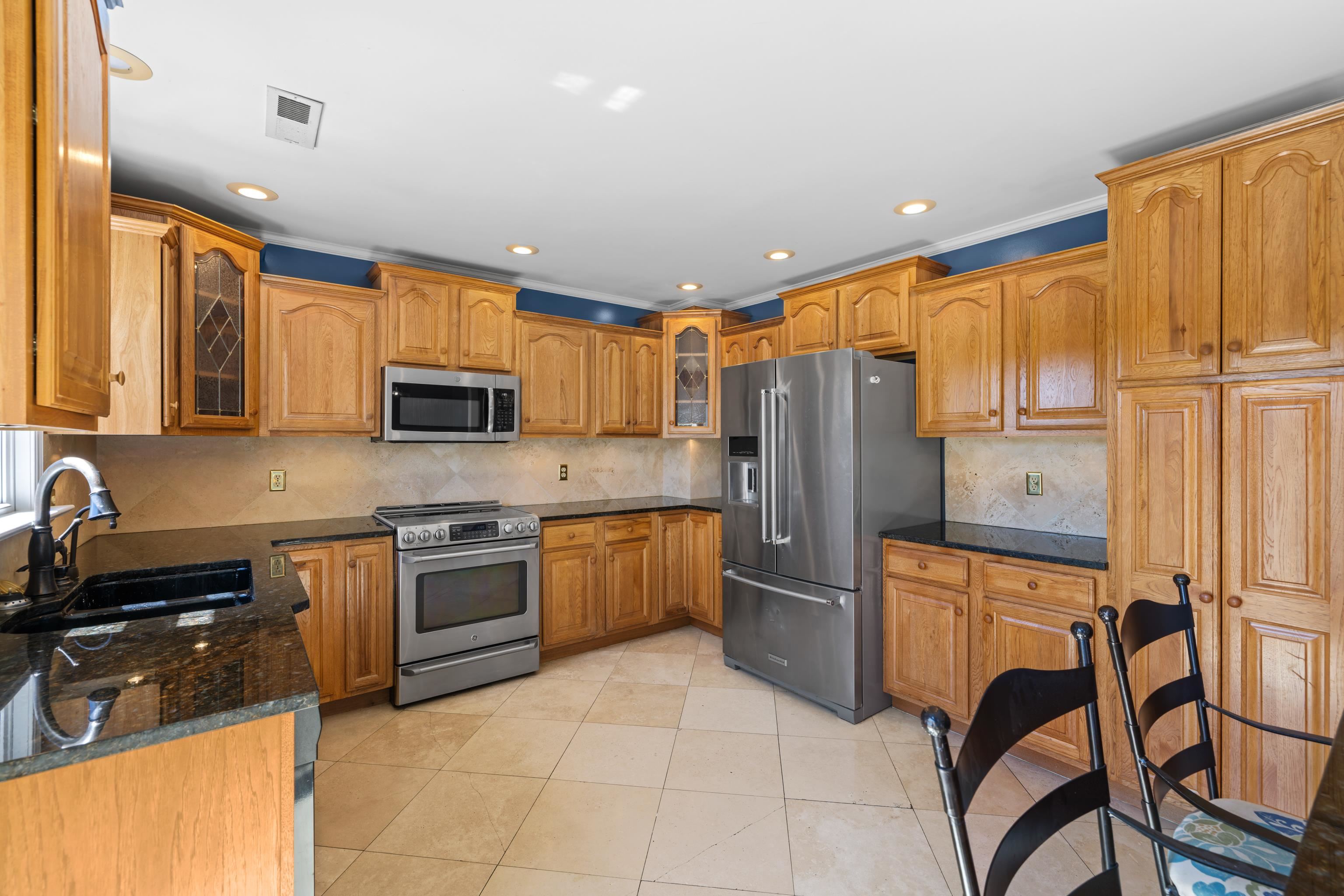 1569 Massanetta Springs Road Harrisonburg, VA 22801 - Photo 30 of 75 a kitchen with stainless steel appliances granite countertop a refrigerator and a stove top oven