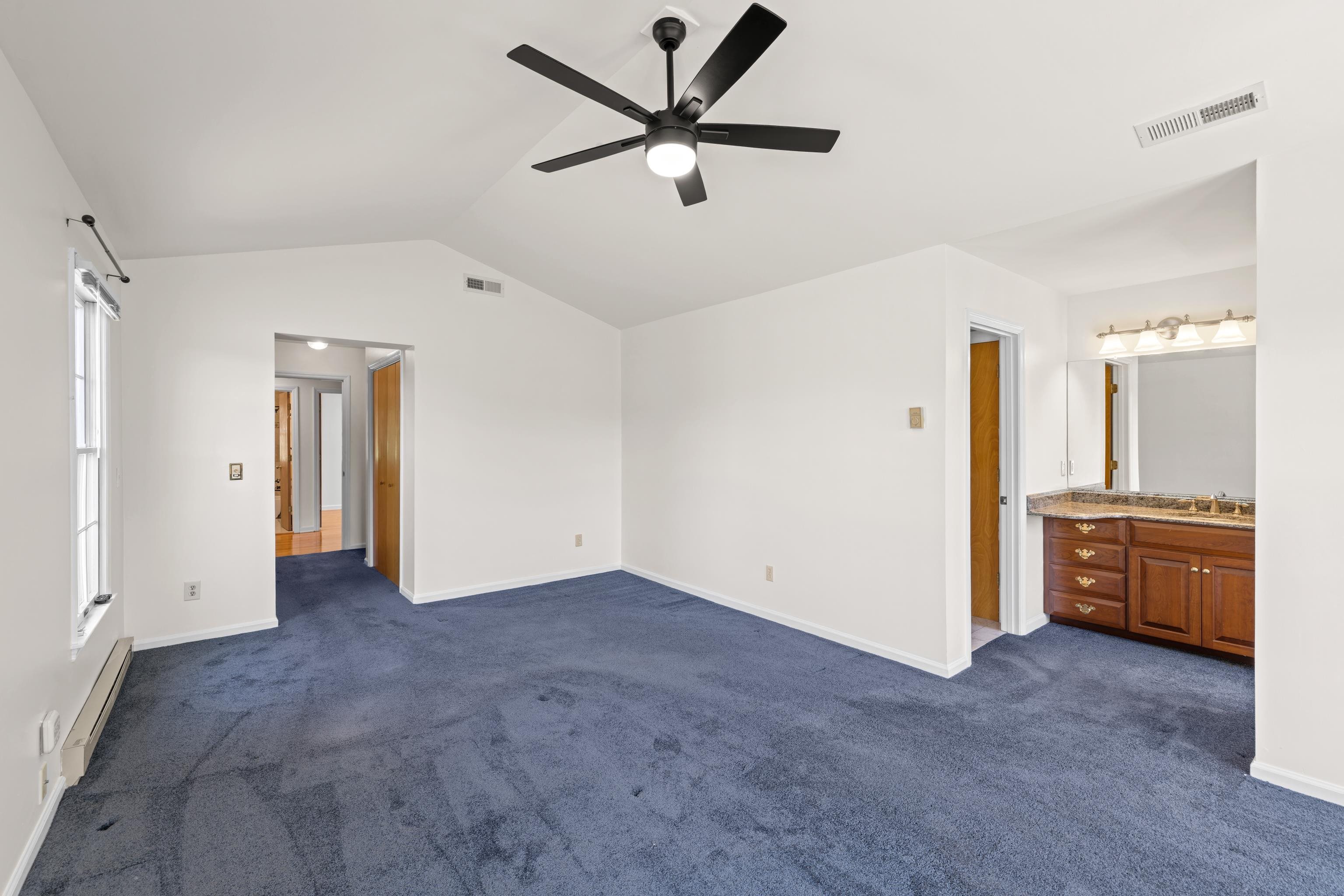 1569 Massanetta Springs Road Harrisonburg, VA 22801 - Photo 38 of 75 a view of an empty room with a kitchen