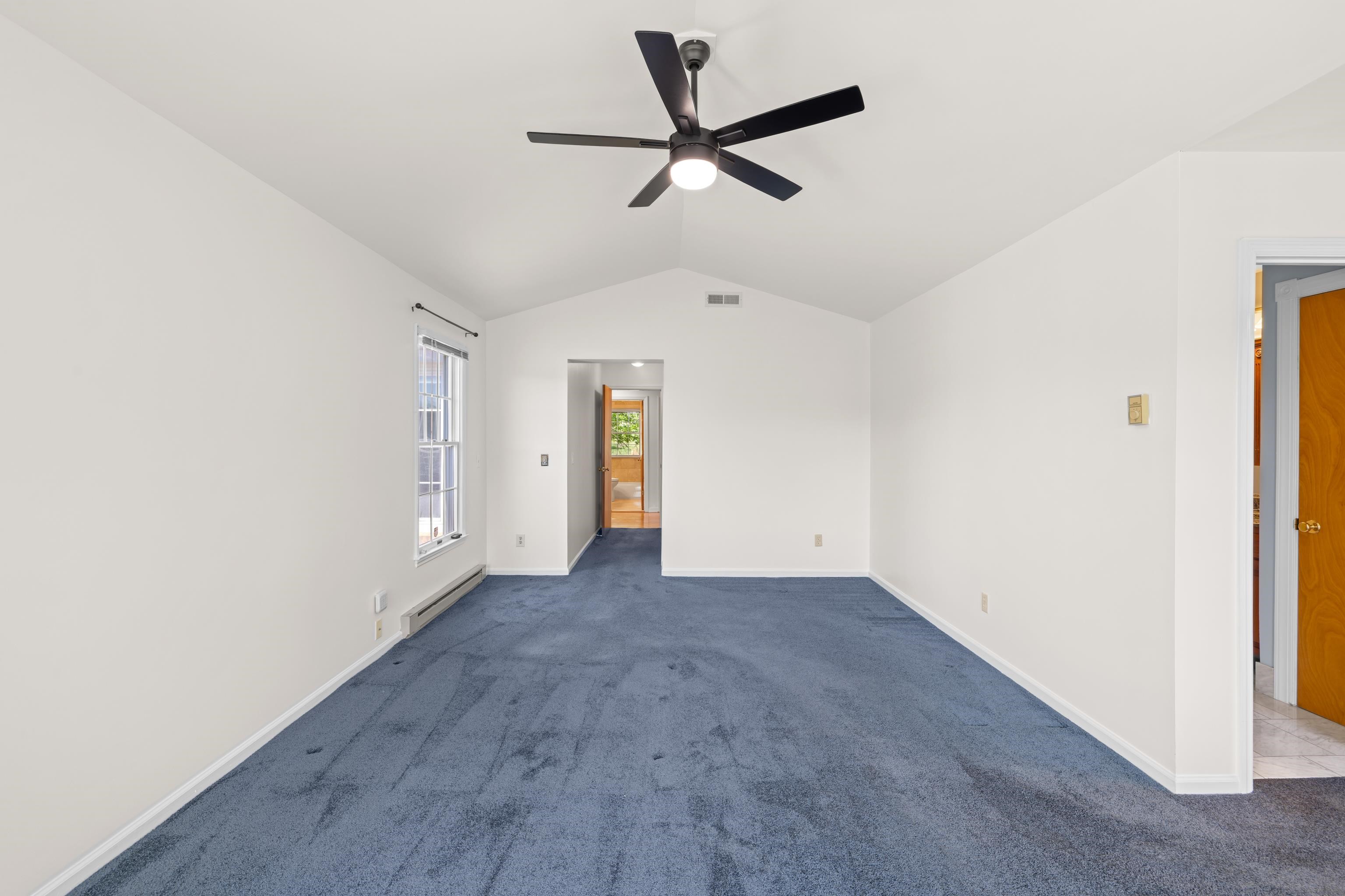 1569 Massanetta Springs Road Harrisonburg, VA 22801 - Photo 40 of 75 a view of a livingroom with a ceiling fan and wooden floor