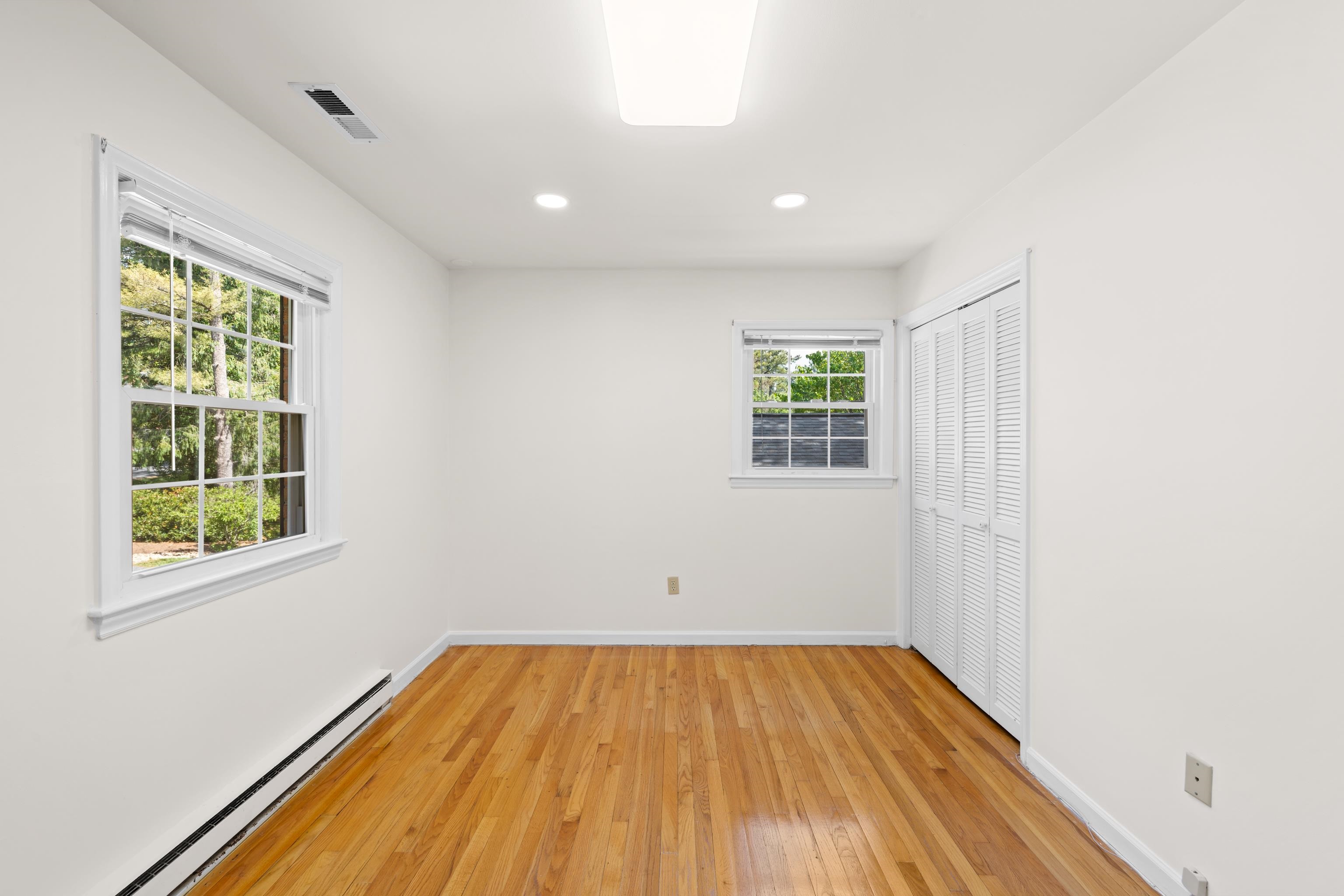 1569 Massanetta Springs Road Harrisonburg, VA 22801 - Photo 44 of 75 a view of empty room with wooden floor and fan