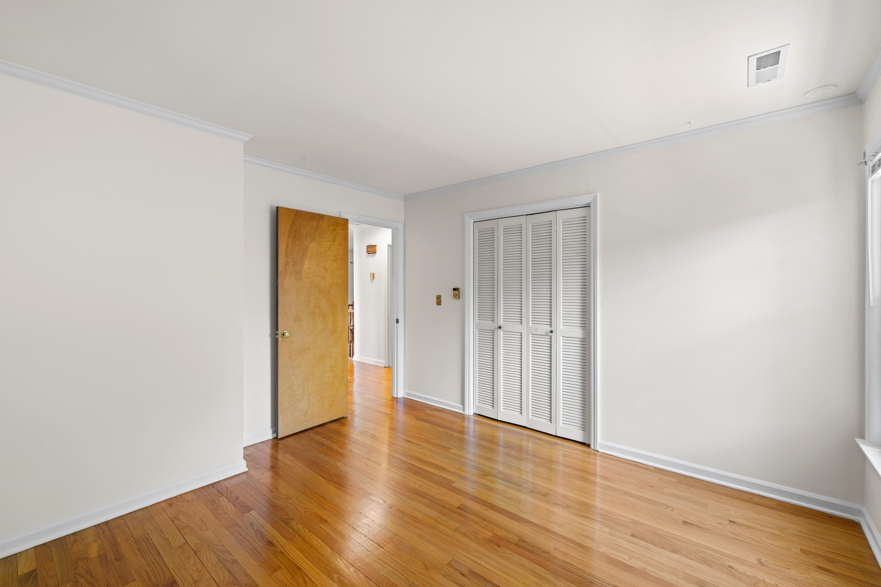 1569 Massanetta Springs Road Harrisonburg, VA 22801 - Photo 50 of 75 a view of an empty room with wooden floor