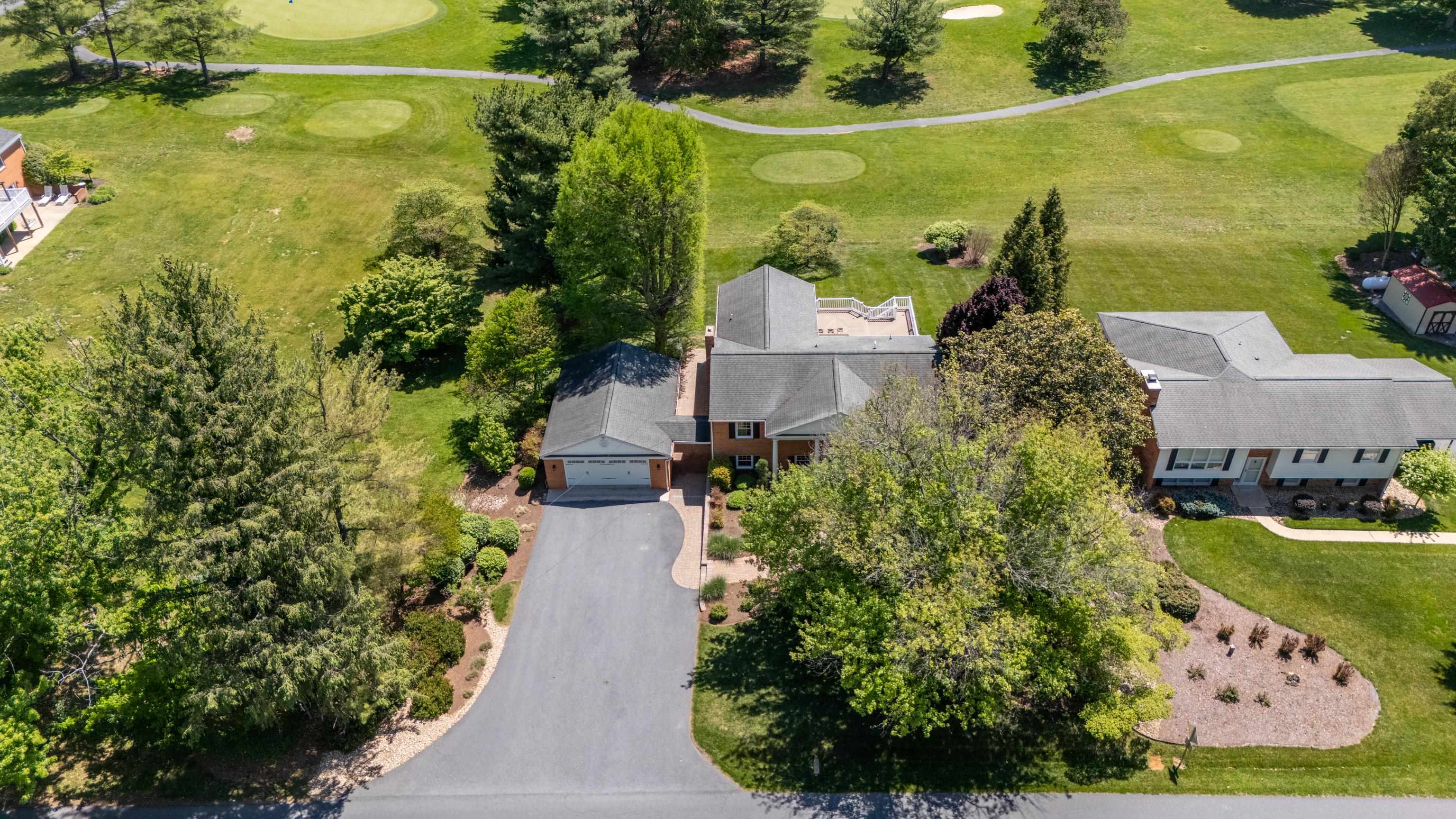 1569 Massanetta Springs Road Harrisonburg, VA 22801 - Photo 67 of 75 an aerial view of a house with a garden and lake view