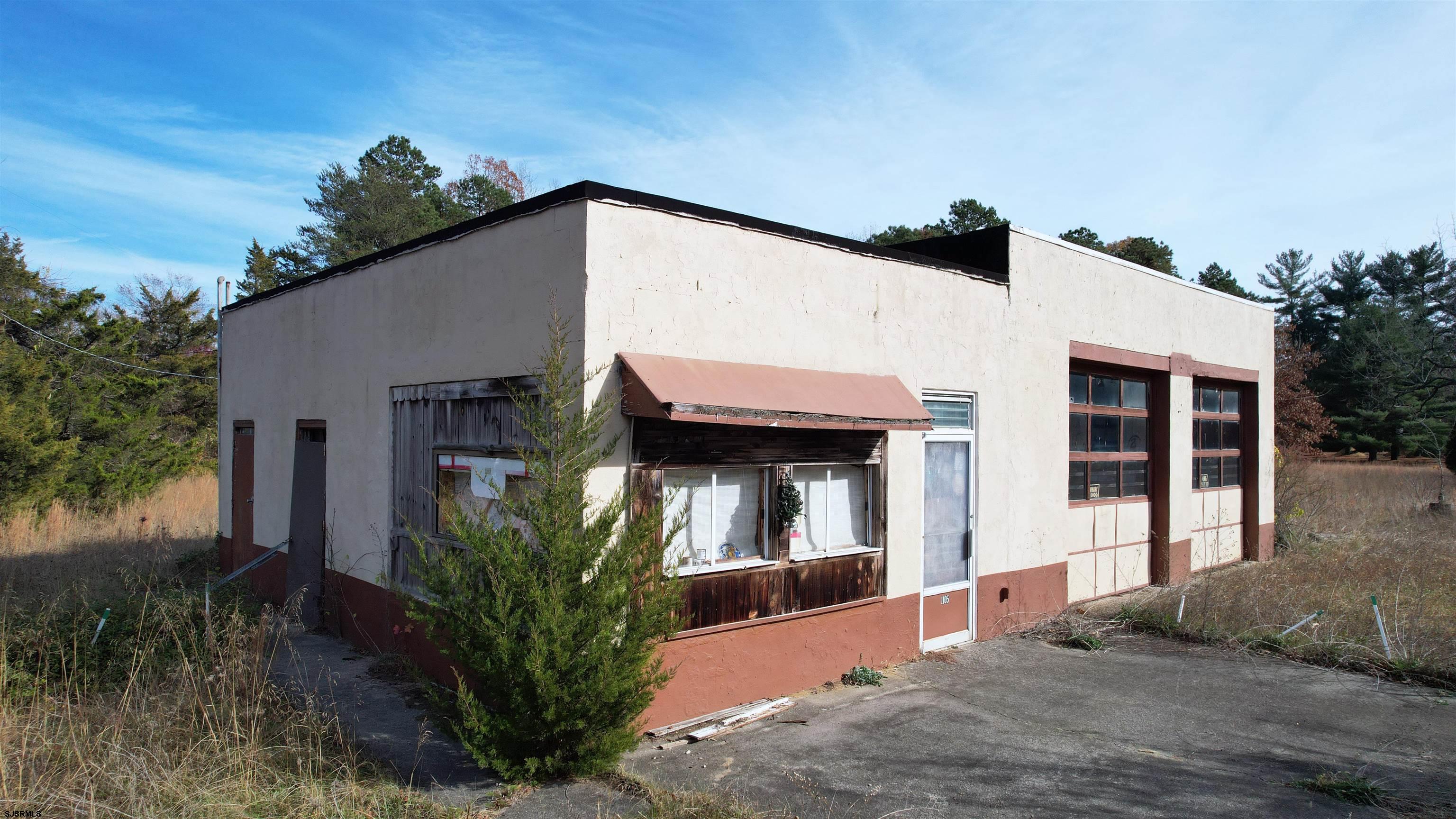 1105 Tuckahoe Road Milmay, NJ 08340 - Photo 18 of 20 a front view of a house with a yard