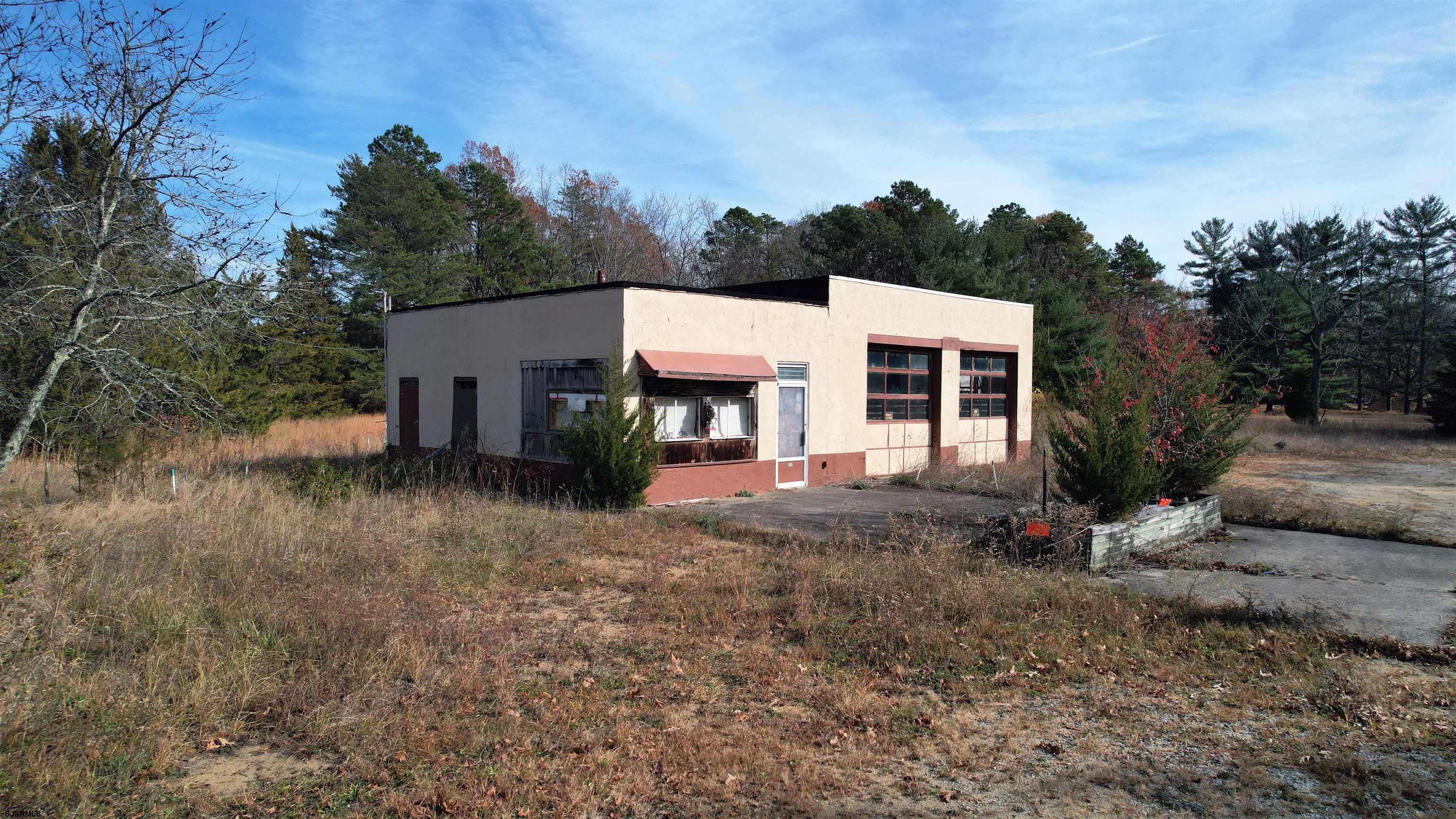 1105 Tuckahoe Road Milmay, NJ 08340 - Photo 4 of 20 a view of a house with a yard and tree s