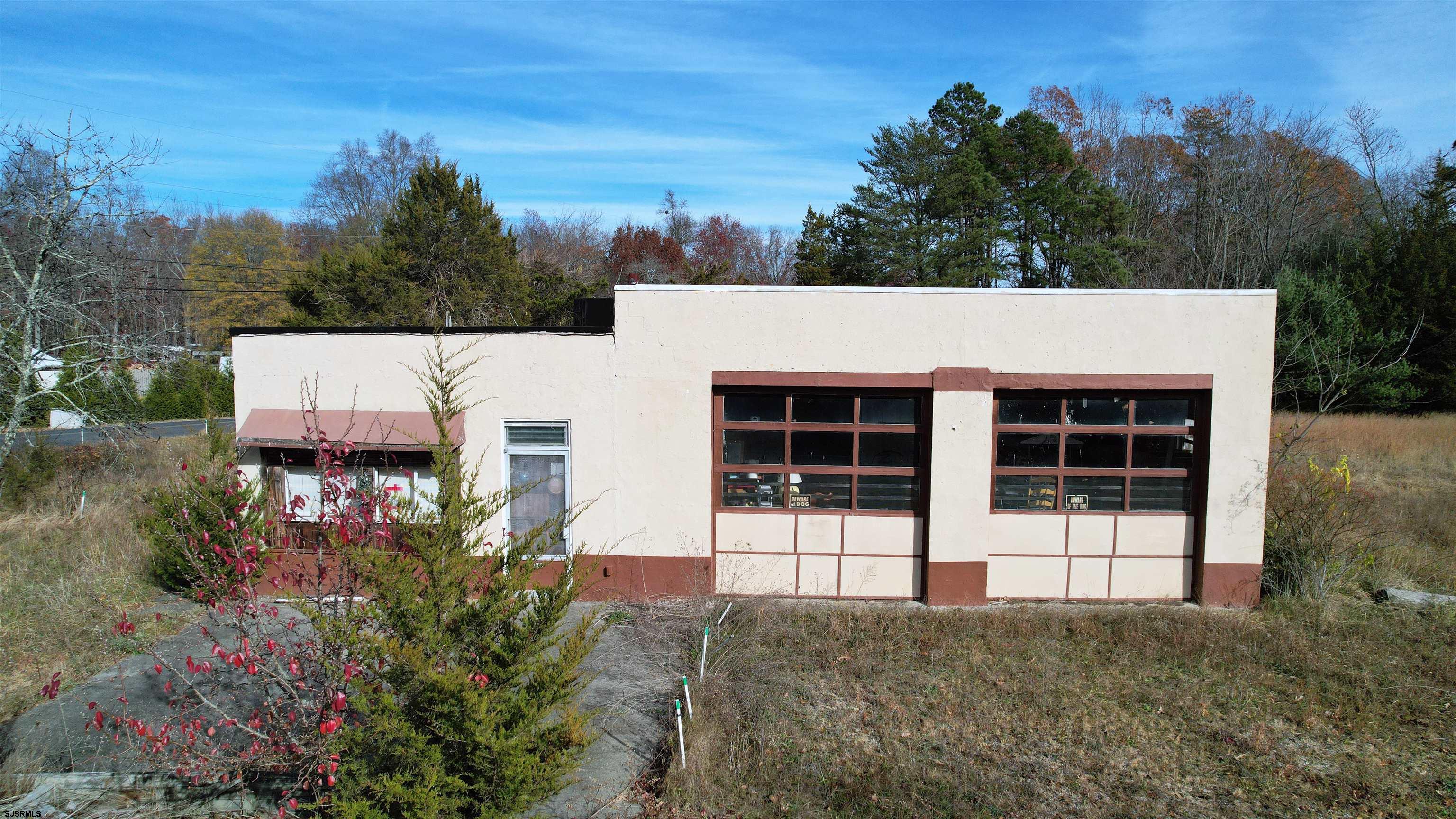 1105 Tuckahoe Road Milmay, NJ 08340 - Photo 5 of 20 front view of a house with a garden