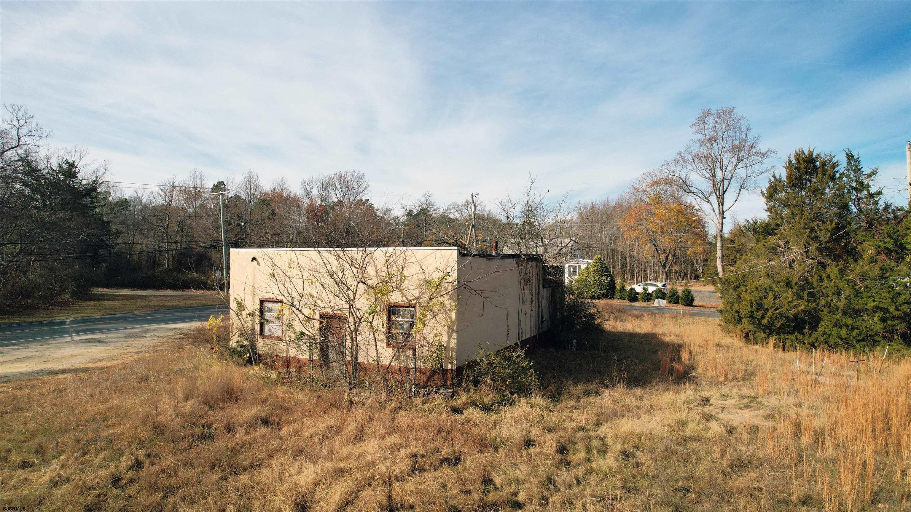 1105 Tuckahoe Road Milmay, NJ 08340 - Photo 10 of 20 a view of a yard with wooden fence