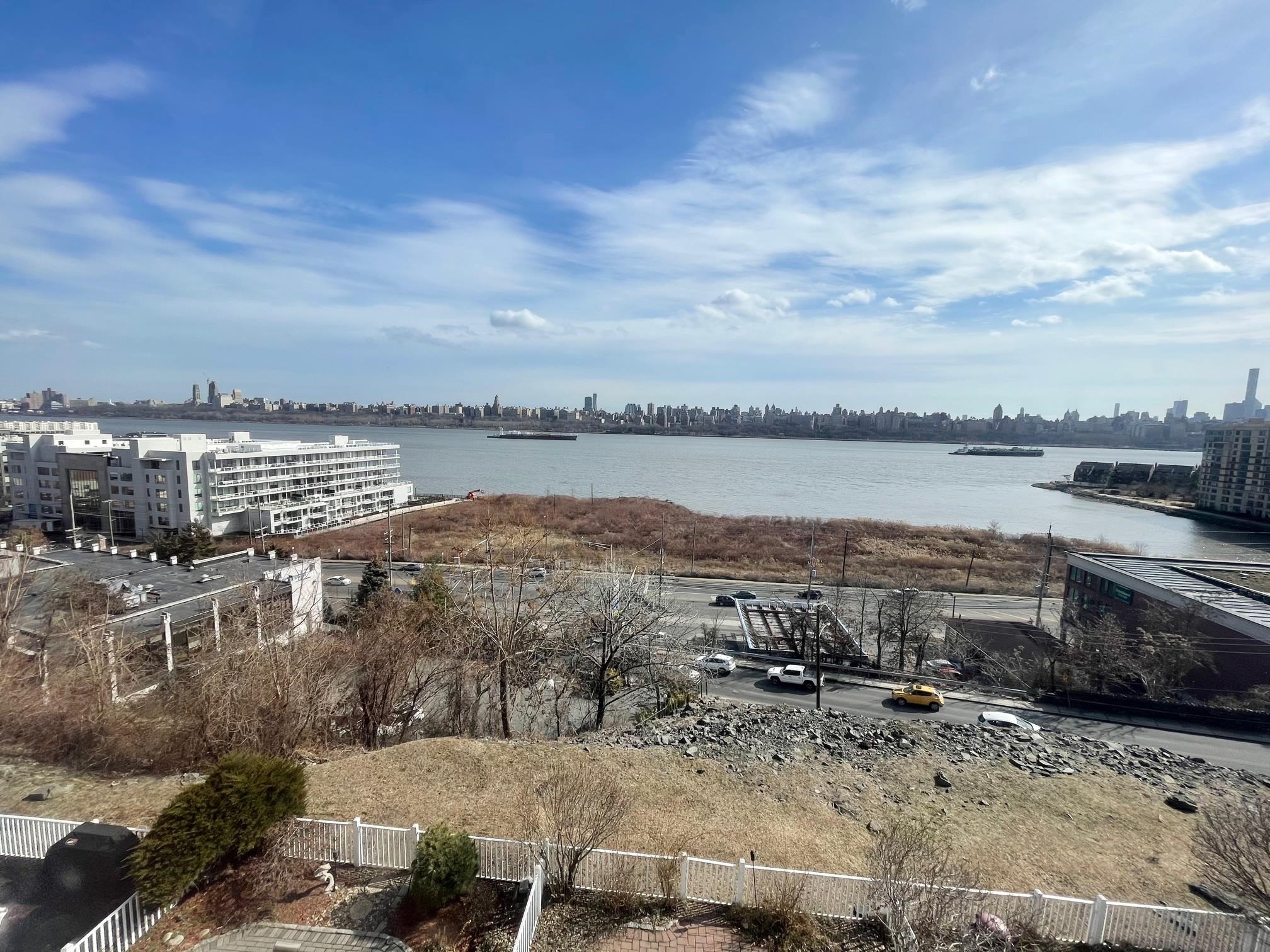a view of a lake with city