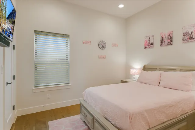 a bathroom with a double vanity sink mirror and shower