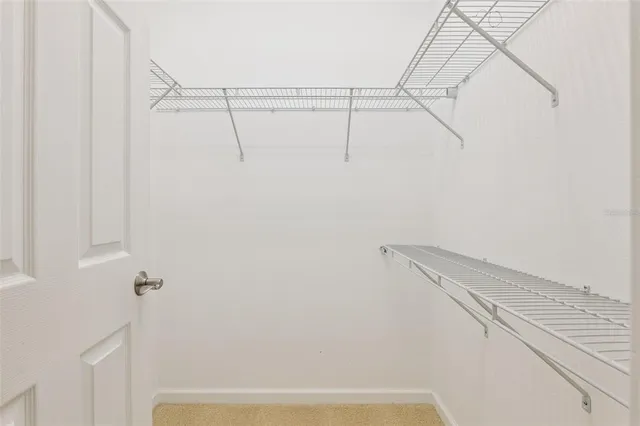 a view of small space with racks on the wall