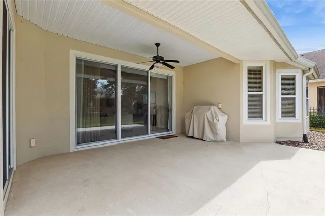 a view of a livingroom with a chandelier and living room