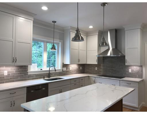 53 Wellesley Rd Extension Natick, MA 01760 - Photo 1 of 33 a kitchen with stainless steel appliances granite countertop a sink a stove and a wooden cabinets