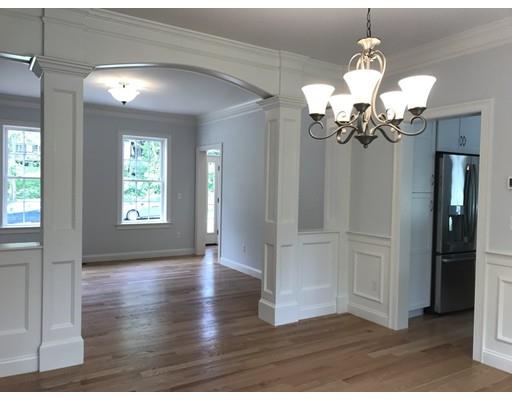 53 Wellesley Rd Extension Natick, MA 01760 - Photo 11 of 33 a view of an entryway with wooden floor