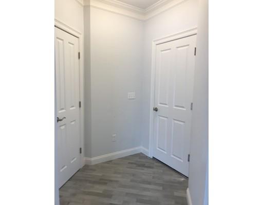 53 Wellesley Rd Extension Natick, MA 01760 - Photo 17 of 33 a view of an empty room