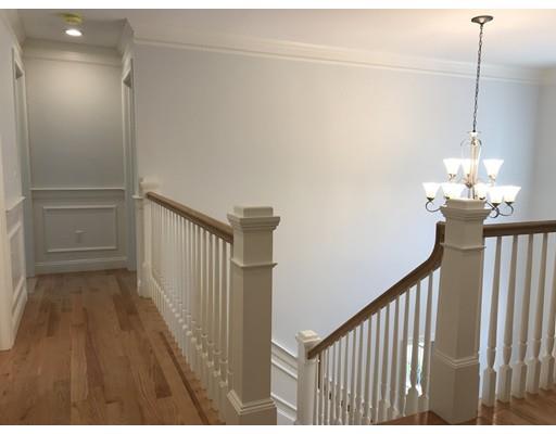 53 Wellesley Rd Extension Natick, MA 01760 - Photo 18 of 33 a view of a hallway view with staircase