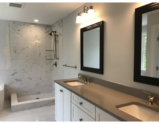 53 Wellesley Rd Extension Natick, MA 01760 - Photo 21 of 33 a bathroom with a sink double vanity granite tub shower and a mirror