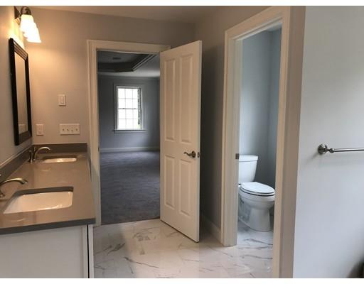 53 Wellesley Rd Extension Natick, MA 01760 - Photo 23 of 33 a bathroom with a toilet and a sink