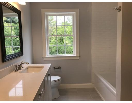53 Wellesley Rd Extension Natick, MA 01760 - Photo 26 of 33 a bathroom with a sink a toilet and tub