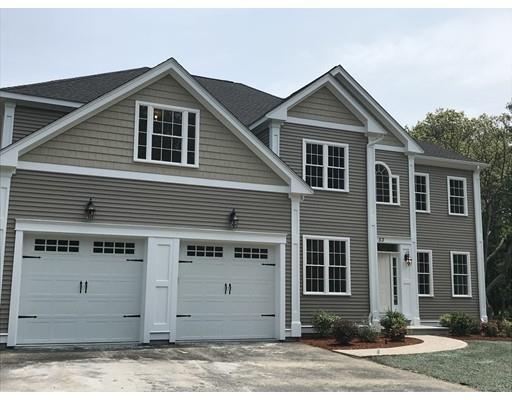 53 Wellesley Rd Extension Natick, MA 01760 - Photo 3 of 33 a front view of a house with a yard