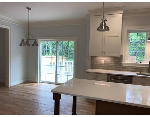 53 Wellesley Rd Extension Natick, MA 01760 - Photo 5 of 33 a view of a room with a chandelier