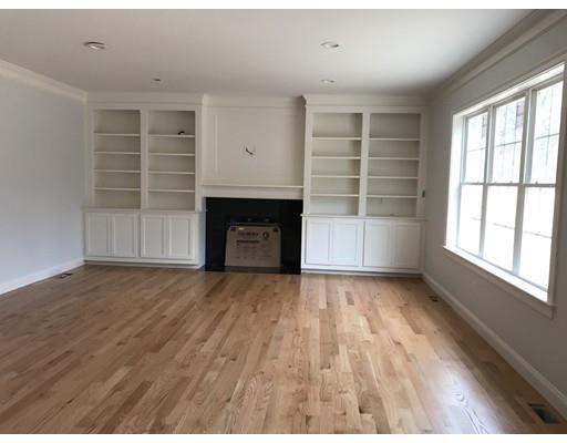 53 Wellesley Rd Extension Natick, MA 01760 - Photo 9 of 33 wooden floor in an empty room with a window