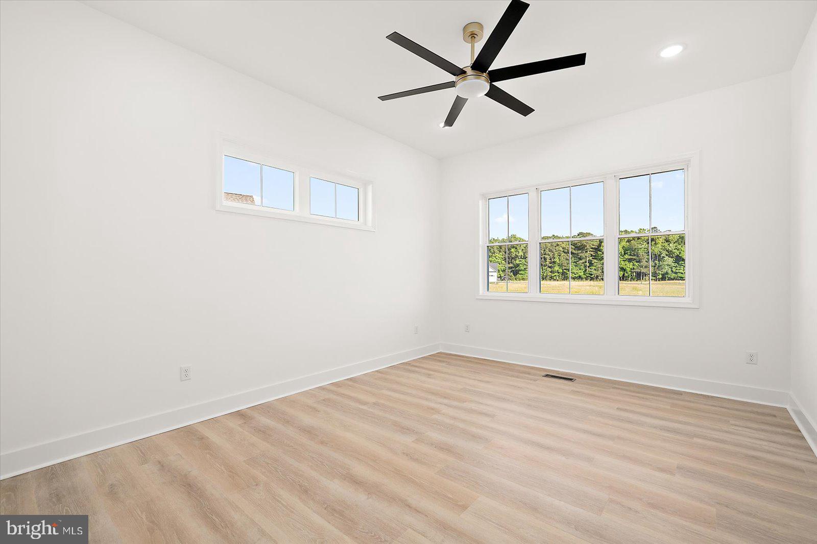 75 King Richard Road Berlin, MD 21811 - Photo 29 of 107 Primary Bedroom with ceiling fan
