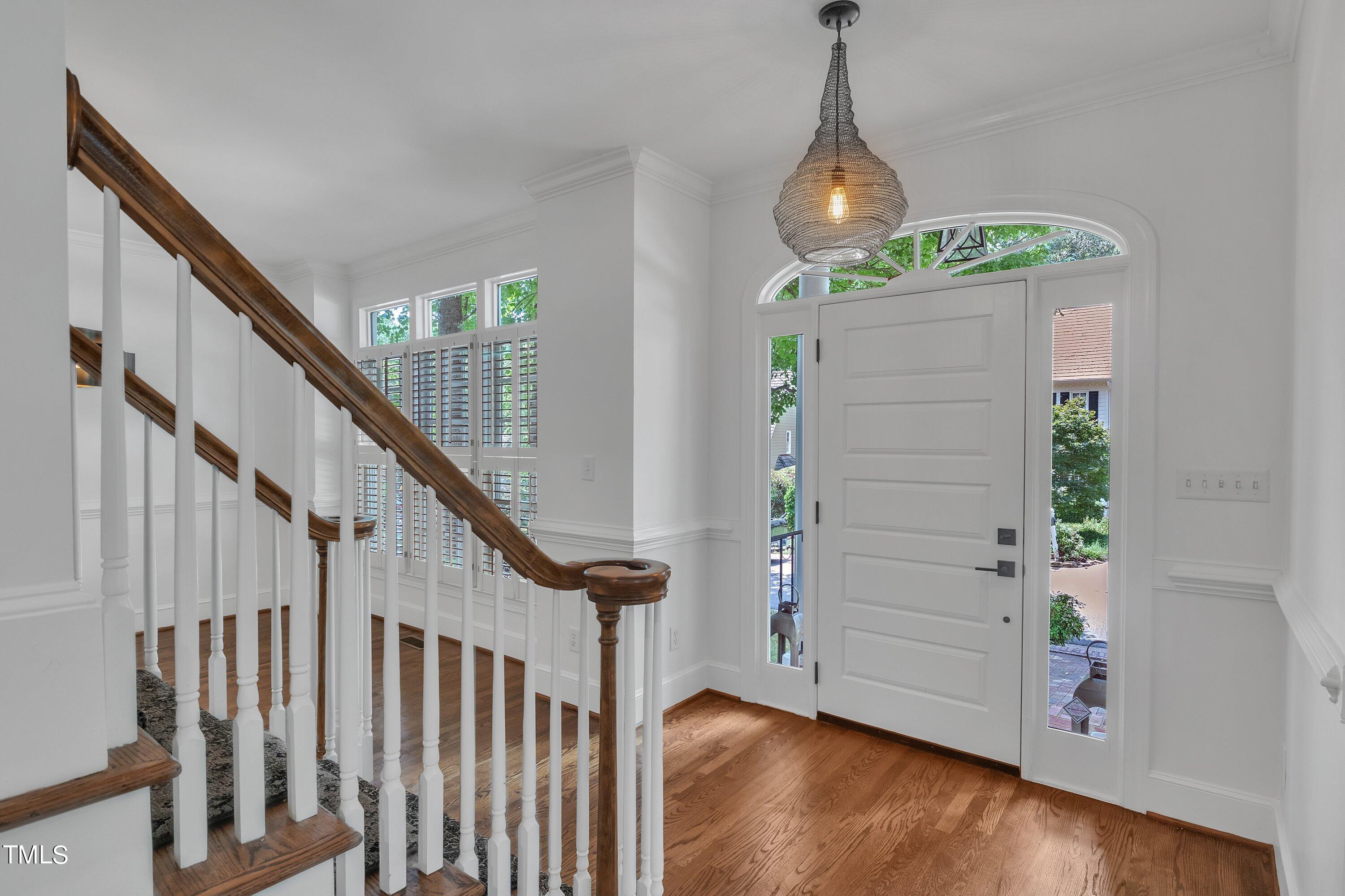8500 Caldbeck Drive Raleigh, NC 27615 - Photo 3 of 37 a view of entryway with stairs