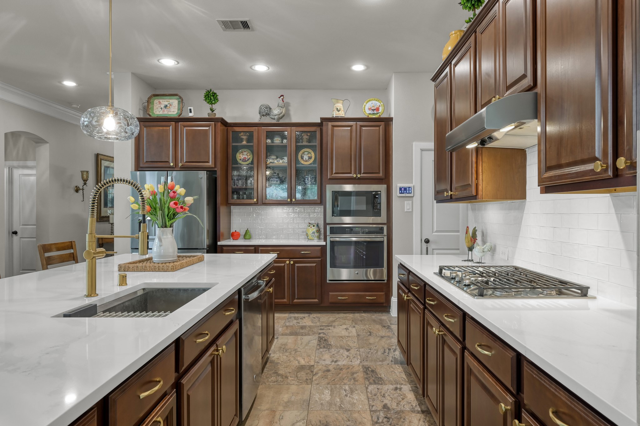 31742 Serrano Bluff Lane Spring, TX 77386 - Photo 5 of 40 Timeless modern finishes such as 3cm Quartz countertops, Upgraded appliances and fixtures.