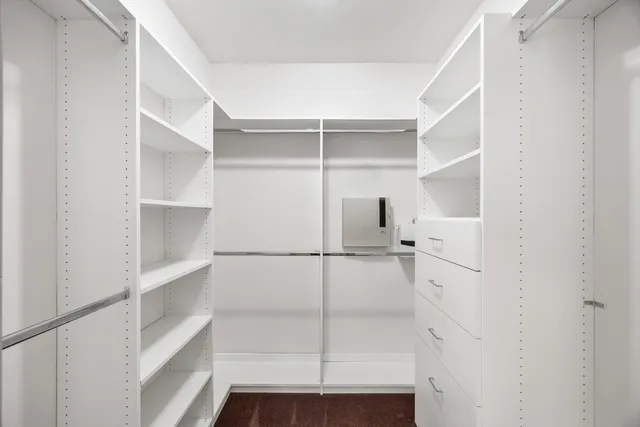 a view of a balcony with a green space