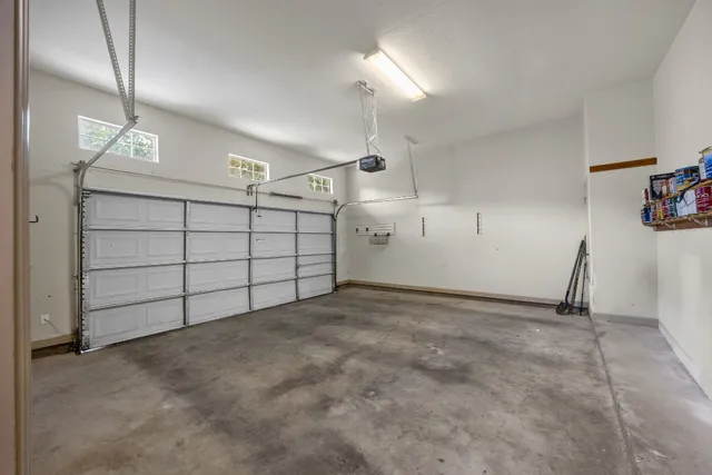 a house view with a backyard space and garden