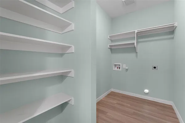 a view of an empty walk in closet