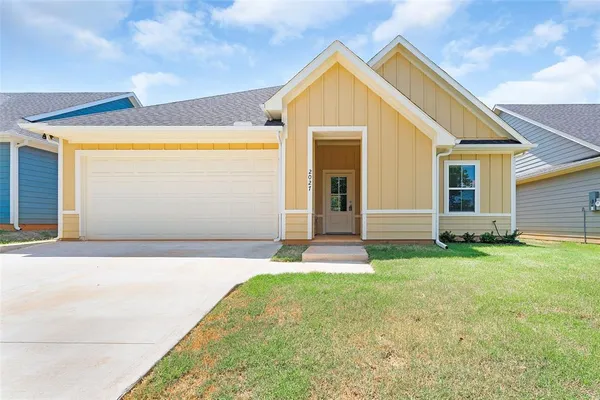 a front view of house with yard