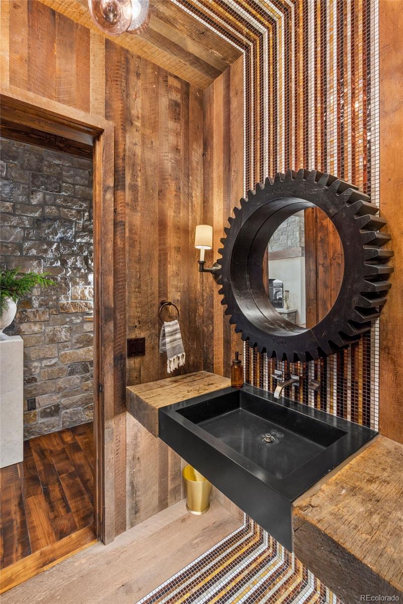 34650 Sleeping Fox Trail Evergreen, CO 80439 - Photo 13 of 49 a view of a balcony and car parked