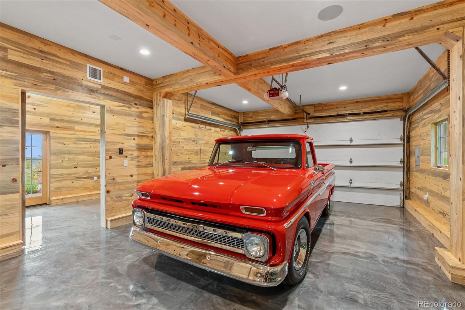 34650 Sleeping Fox Trail Evergreen, CO 80439 - Photo 45 of 49 a room with pool table and windows