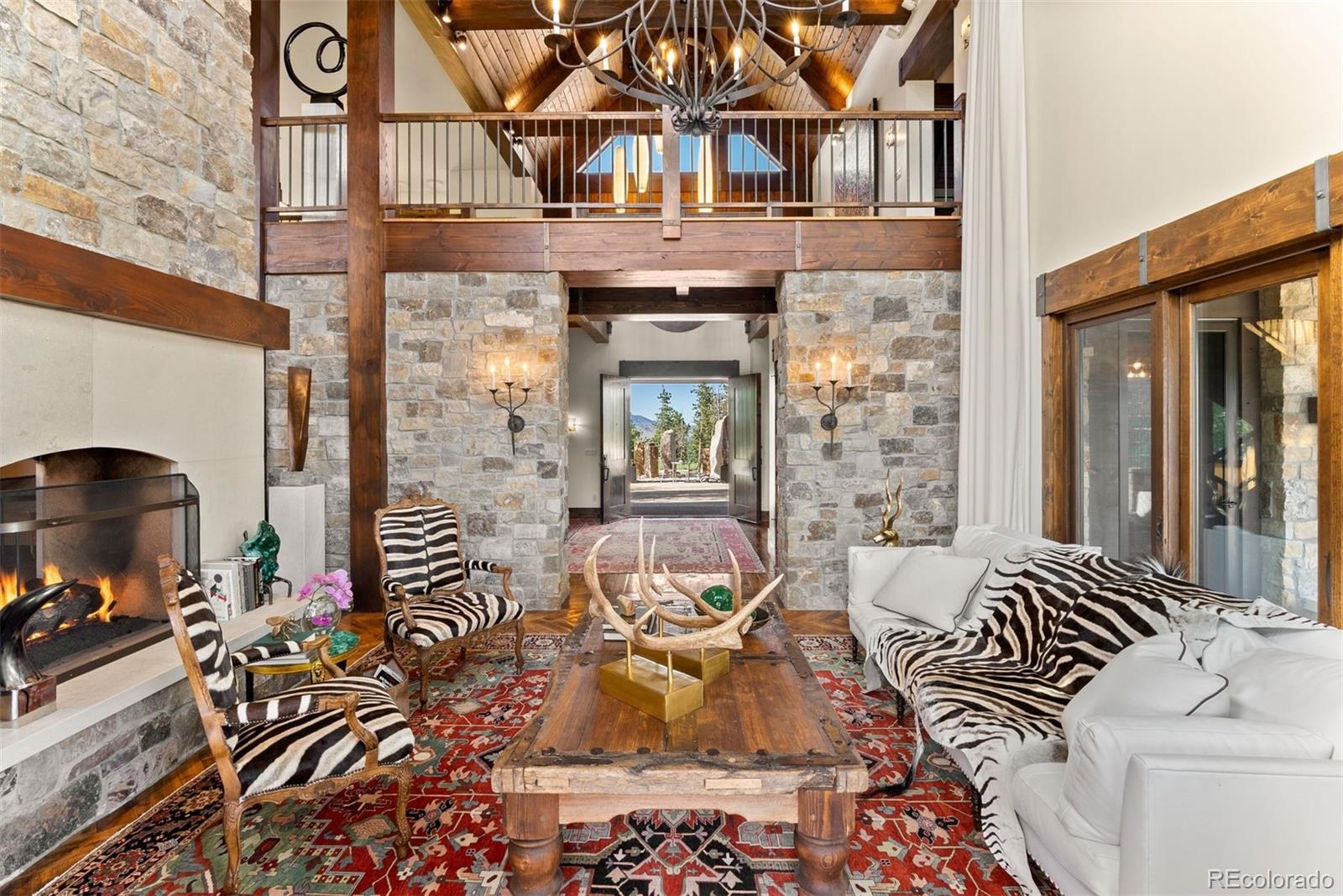 34650 Sleeping Fox Trail Evergreen, CO 80439 - Photo 5 of 49 front view of a house with outdoor seating