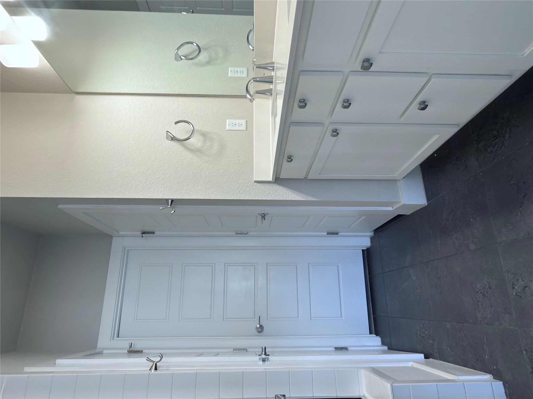 11216 Gadsen Lane Austin, TX 78754 - Photo 16 of 36 A sleek vanity with dual sinks elevates this thoughtfully designed bathroom space.