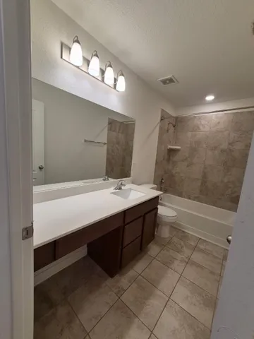 a house view with a garden space