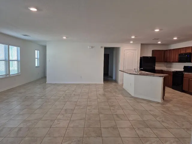 a view of a livingroom with furniture