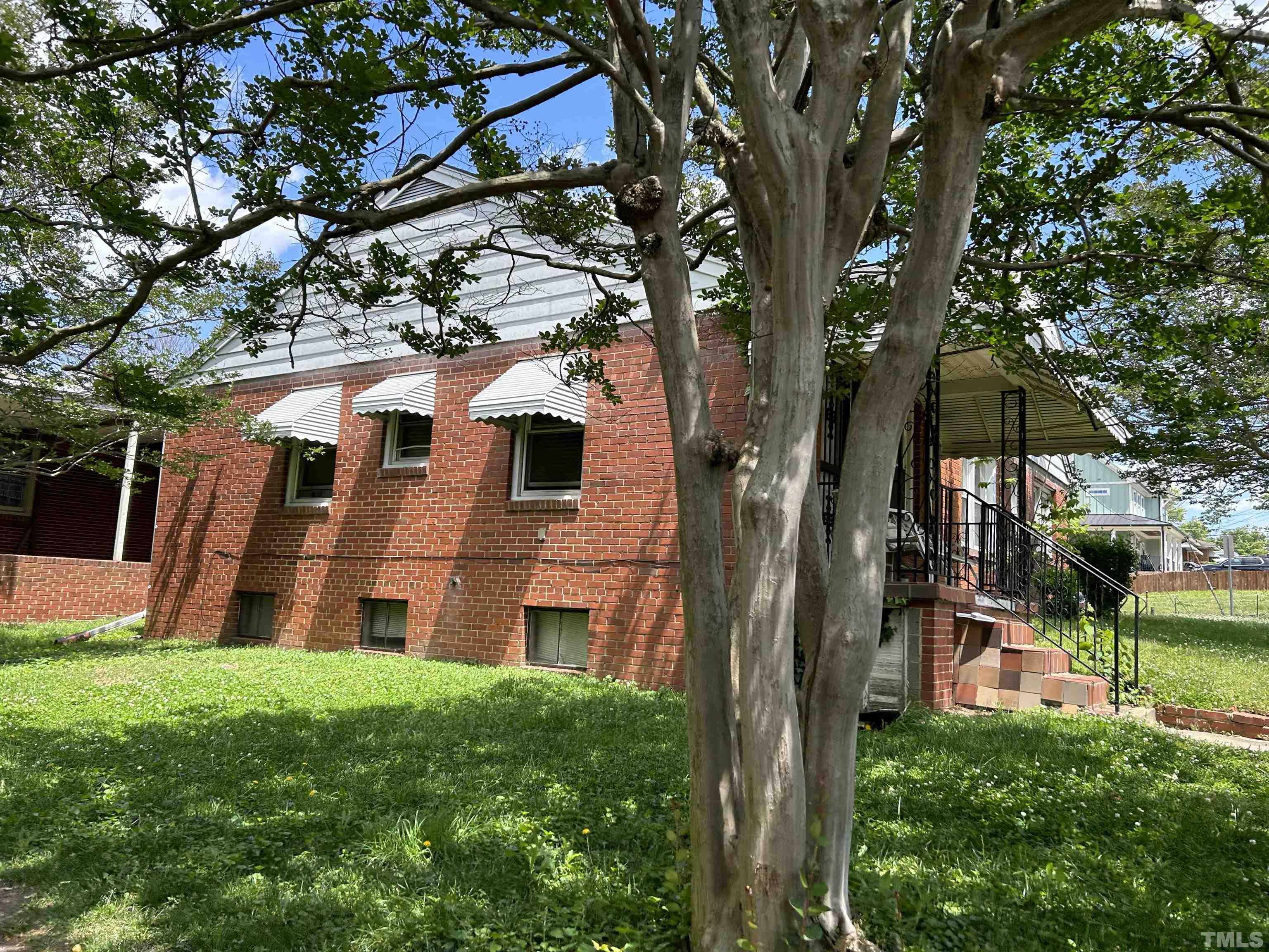 512 Coleman Street Raleigh, NC 27601 - Photo 3 of 3 a view of a house with a yard