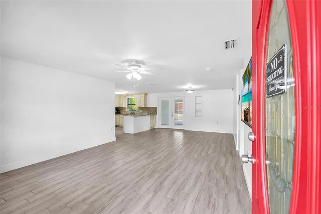 a view of a kitchen with a sink and dishwasher