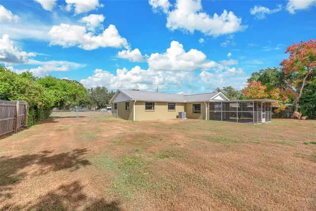 a front view of a house with yard