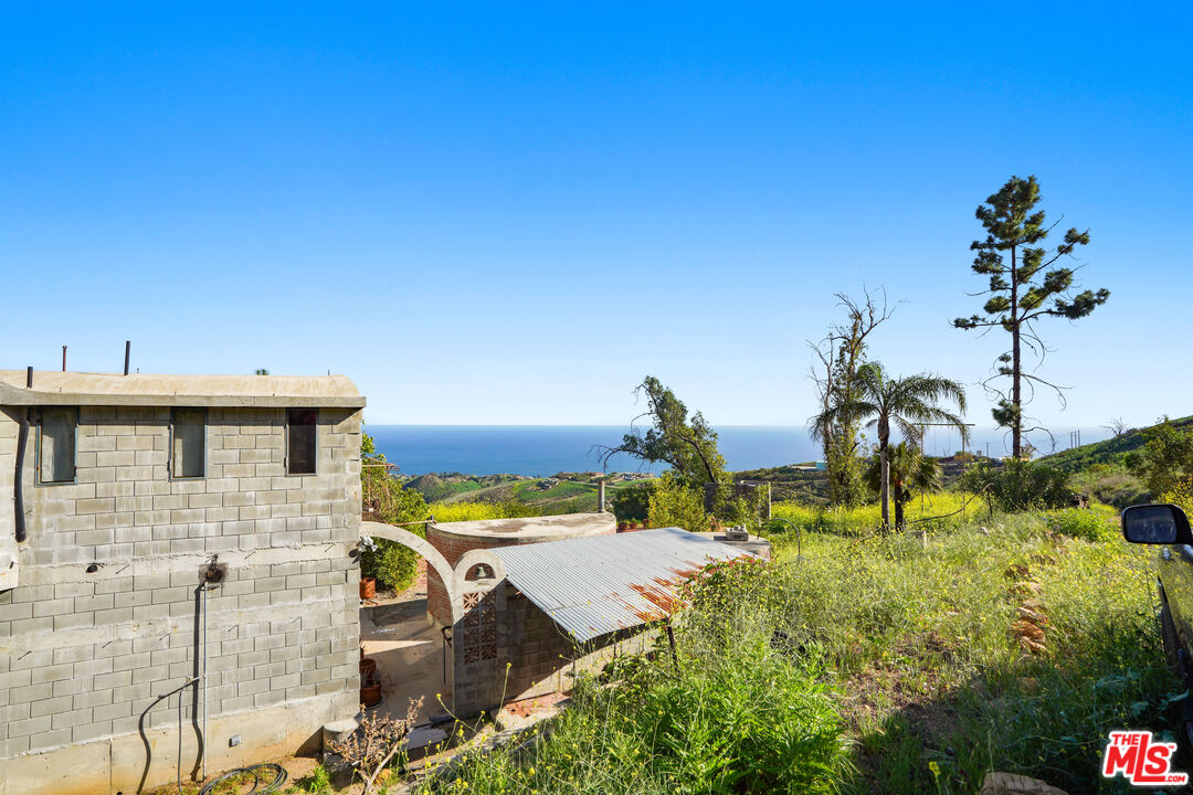 5524 Murphy Way Malibu, CA 90265 - Photo 2 of 14 a view of a house with a yard and sitting area