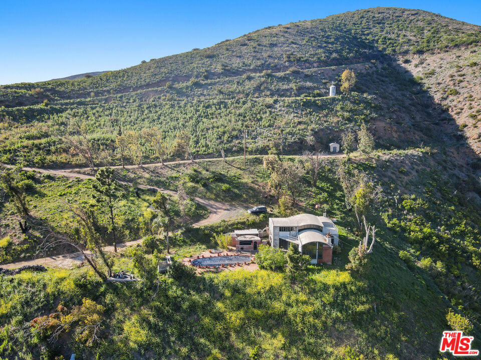 5524 Murphy Way Malibu, CA 90265 - Photo 5 of 14 a view of a yard with an outdoor space
