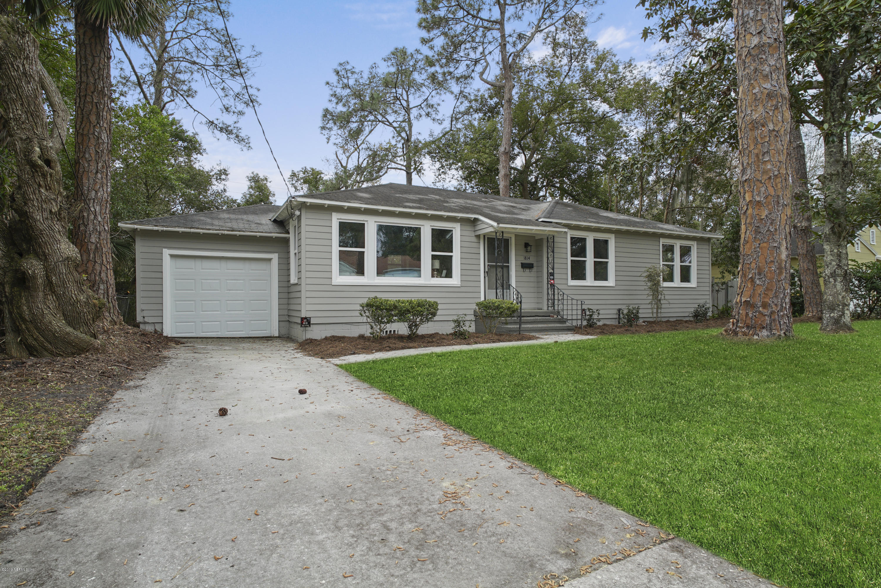 1814 Mayfair Road Jacksonville, FL 32207 - Photo 1 of 18 front view of house with a yard