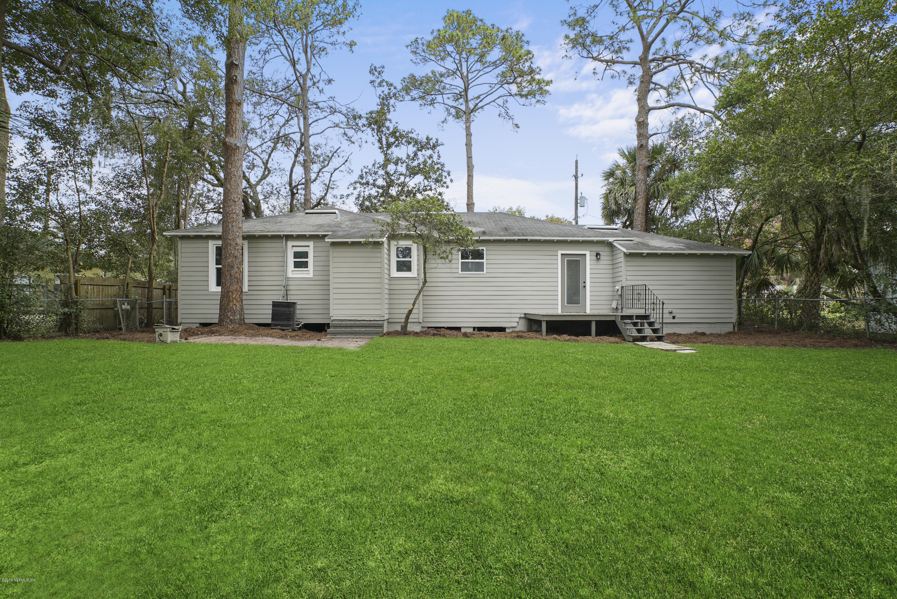1814 Mayfair Road Jacksonville, FL 32207 - Photo 15 of 18 a view of a house with backyard and garden