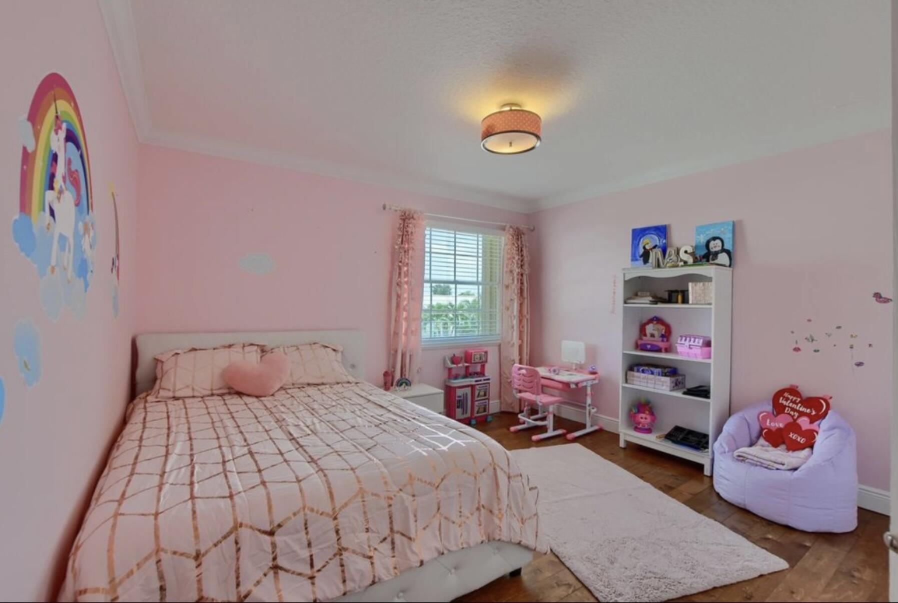 9460 Lake Serena Drive Boca Raton, FL 33496 - Photo 17 of 21 a bedroom with a bed and a window