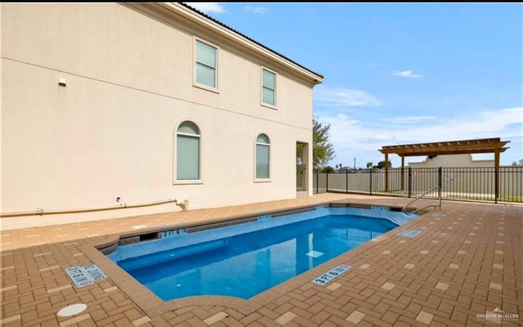 1412 Keeton Avenue, Unit 28 McAllen, TX 78503 - Photo 14 of 15 a view of a terrace with wooden floor and seating space